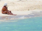 Couple Relaxing on beach in Cozumel at the ALL inclusive